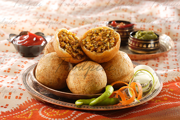 Moong Dal Kachori Spicy deep fried quiche with moong dal inside stock photo