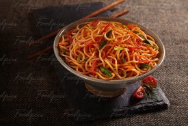 Vegetable Schezwan Noodles Vegetables & noodles tossed in schezwan sauce image preview