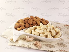 Dry fruits Almonds & cashews in white bowls preview