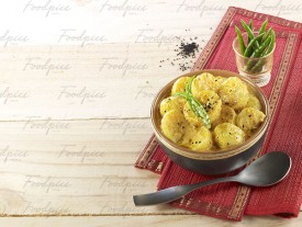 Aloo Posto Potatoes cooked in curd & poopy seed paste image preview