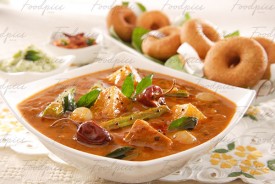 Sambhar Spicy vegetable stew with soft fritters image preview