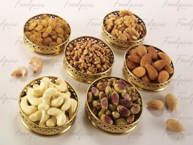 Dry Fruits Various dry fruits in metal bowls image preview