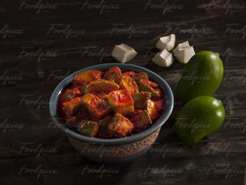 Raw Mango Pickle Raw mango pickle with raw mango cubes image preview