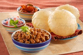 Chole Puri Chickpea curry with puris & salad bowl image preview