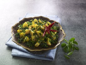 Aloo Methi Potato and fenugreek dry curry in a bowl image preview