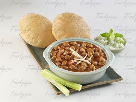Chole Puri Chickpea curry with fried puffed bread image preview