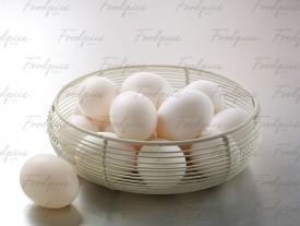 Eggs Raw eggs in a wire basket image preview