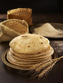 Phulka Whole wheat flat bread with wheat flour and sheaves preview