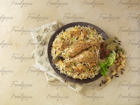 Chicken Biryani Chicken spicy rice with spices around preview