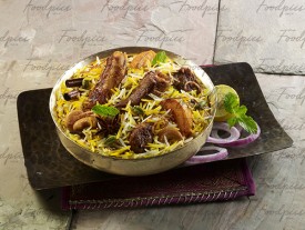 Mutton Biryani Spicy meat rice with lemon and onion image preview
