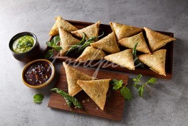 Samosa Platter full of stuffed savoury pastries image preview