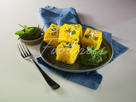 Dhokla Steamed lentil cakes with mint chutney preview