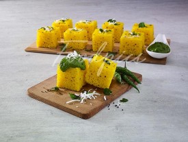 Dhokla Steamed lentil cakes with dollop of chutney image preview