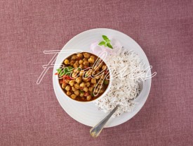 Chole Rice Chick pea curry with rice in top angle image preview