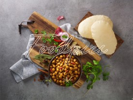 Chole Bhature Top angle shot of chickpea curry & flat breads image preview