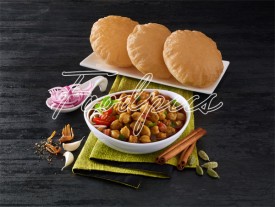 Chole Puri Chick pea curry with fried flat breads image preview
