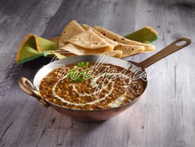 Dal Makhani Creamy spicy lentil curry with flat breads image preview