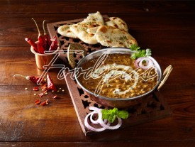Dal Makhani Black lentil curry with flat breads image preview