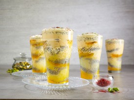 Kesar Pista Falooda Dessert drink with layers of rose syrup, jello, sweet basil seeds, vermicelli, creamy milk & nuts image preview
