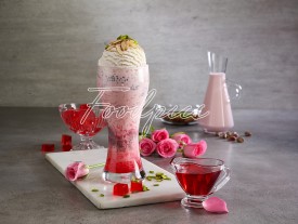 Rose Ice Cream Falooda Rich milk based dessert with rose syrup, basil seeds, Vermicelli topped with Ice cream & dry fruits image preview